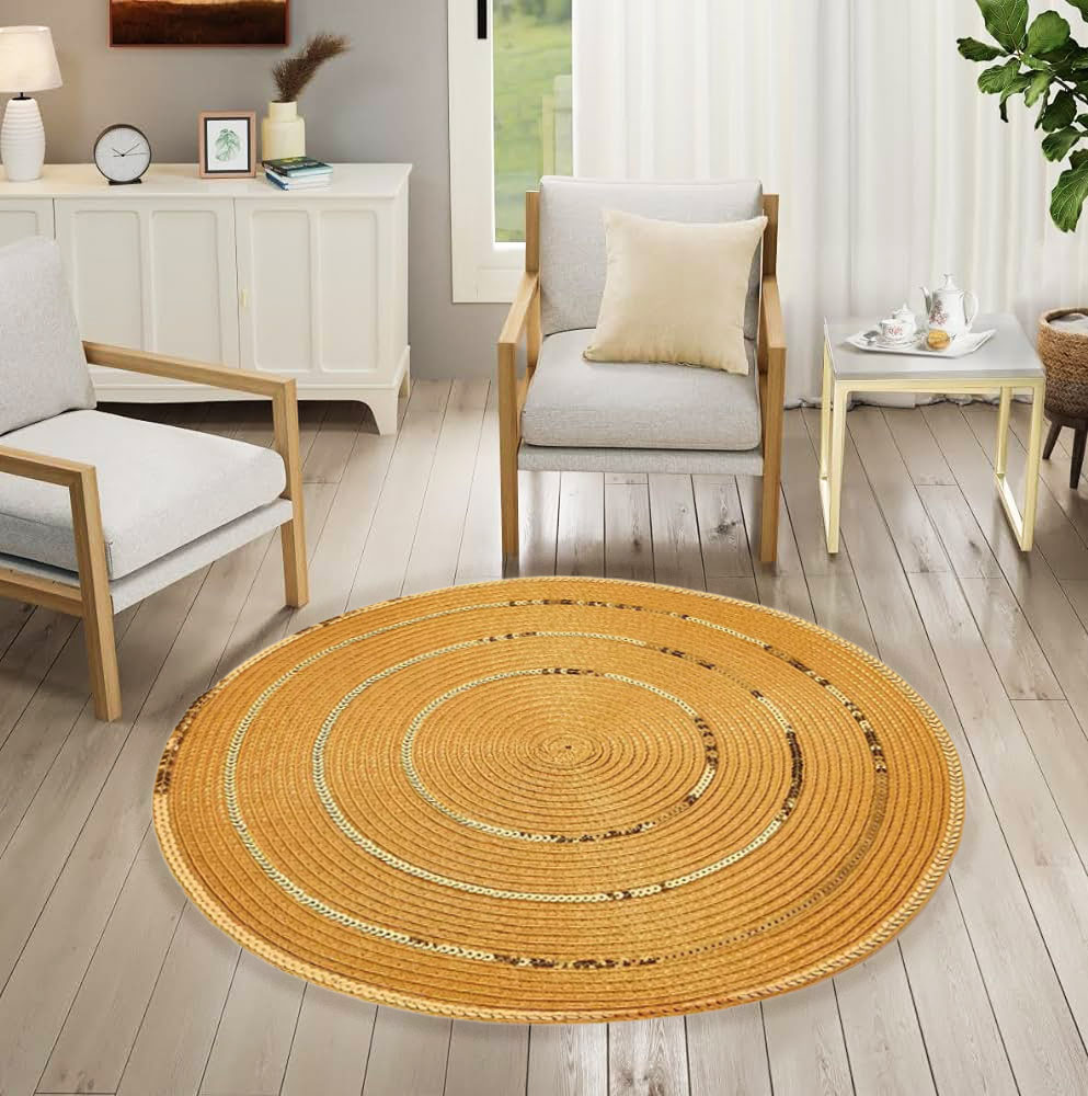 A circular straw mats with a traditional design for floors & tables ...